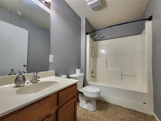 full bathroom featuring vanity, toilet, and bathtub / shower combination