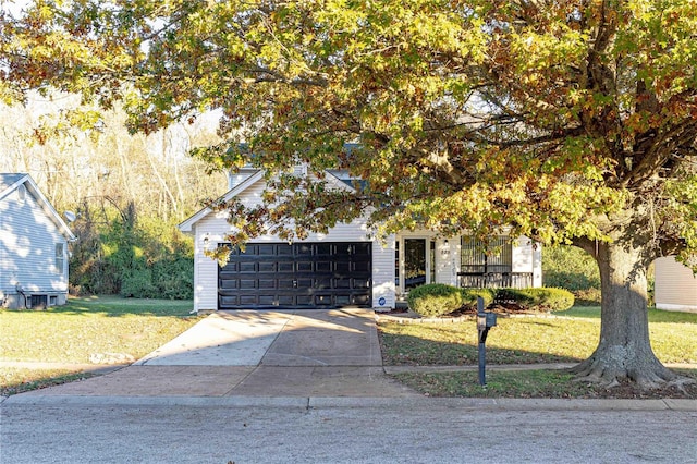 obstructed view of property featuring a front lawn