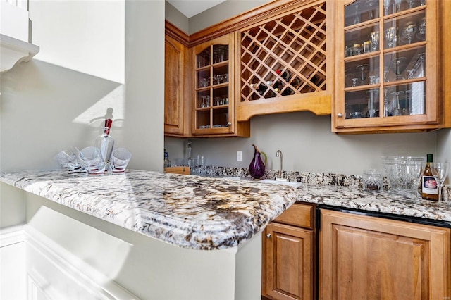 kitchen featuring light stone counters