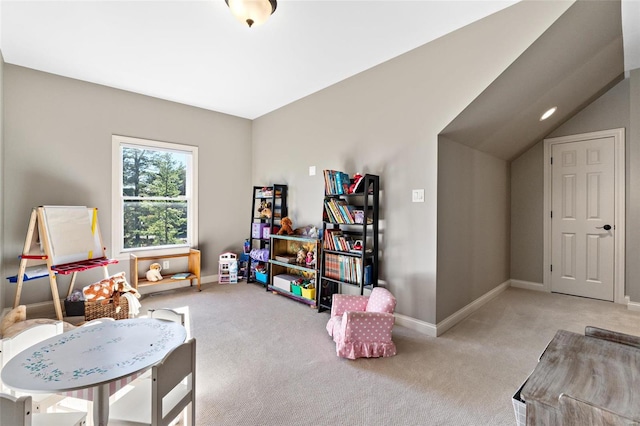 game room with lofted ceiling and light carpet