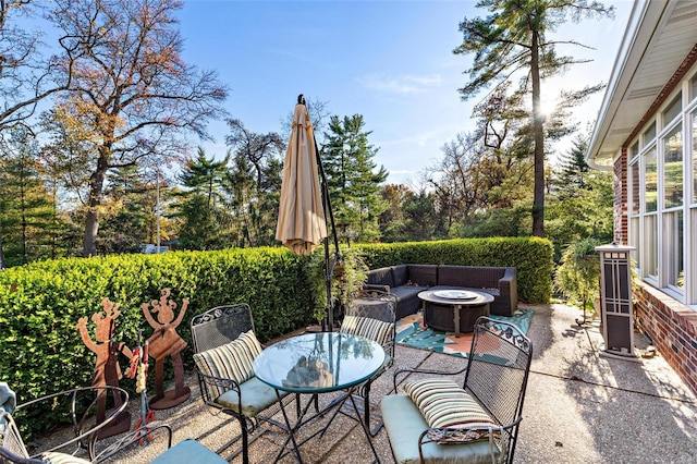 view of patio featuring an outdoor fire pit