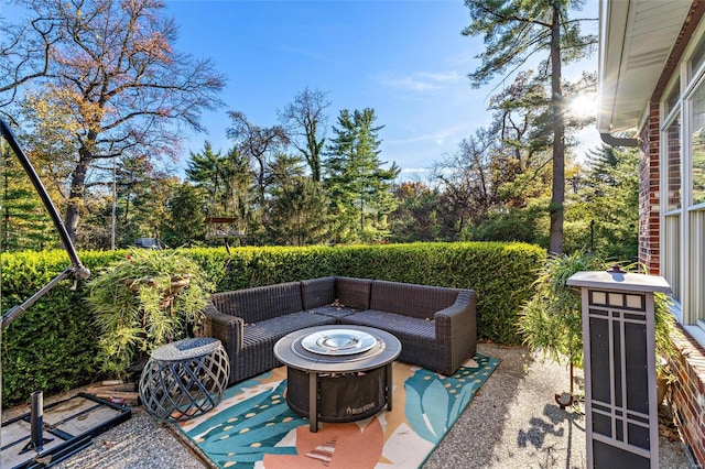 view of patio featuring an outdoor fire pit