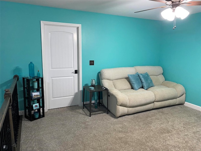 carpeted living room featuring ceiling fan