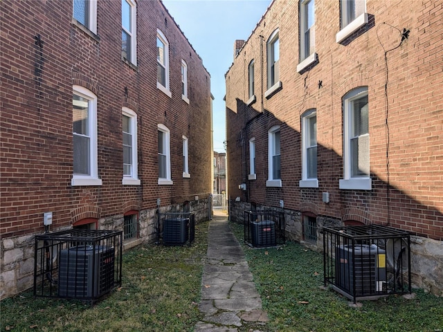 view of side of property with central AC unit