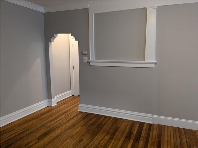 unfurnished room with dark hardwood / wood-style floors and ornamental molding