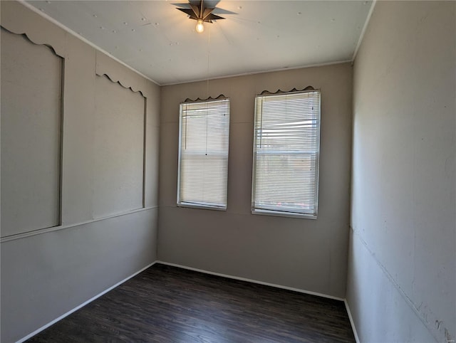 unfurnished room featuring dark hardwood / wood-style floors