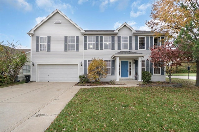 view of front facade featuring a garage and a front yard