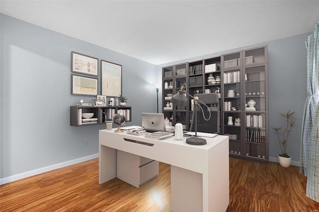 office space featuring hardwood / wood-style floors