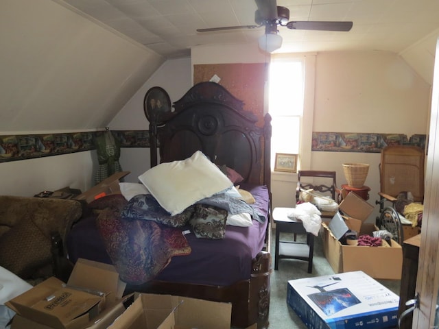 bedroom with carpet, ceiling fan, and lofted ceiling