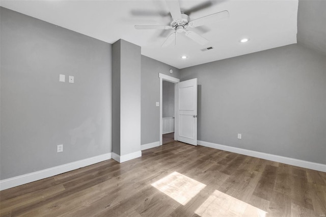 unfurnished bedroom featuring hardwood / wood-style floors and ceiling fan