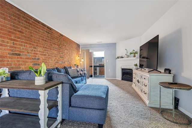 living room featuring carpet floors and brick wall