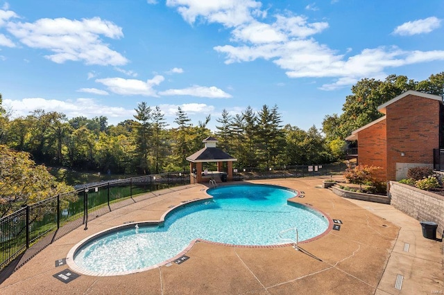 view of pool with a gazebo and a patio