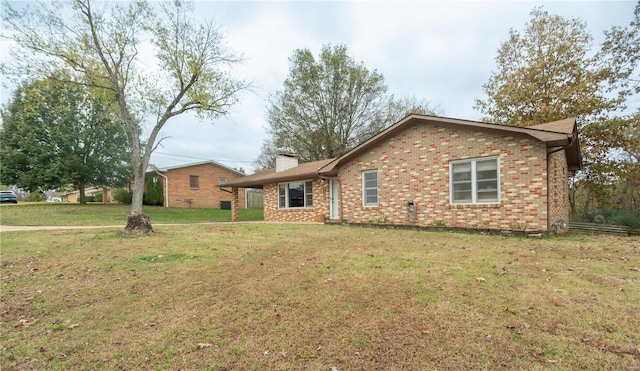 exterior space with a front yard