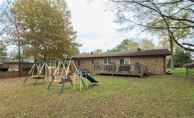 exterior space featuring a wooden deck and a yard