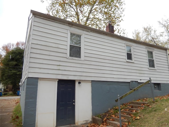 exterior space featuring a chimney