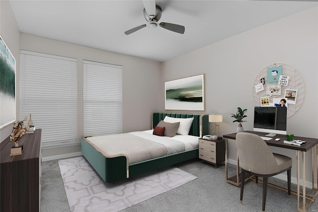 bedroom featuring ceiling fan and carpet floors