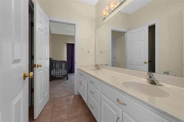 bathroom featuring tile patterned floors and vanity