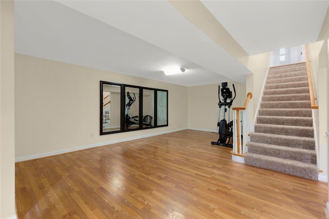 workout room with light wood-type flooring