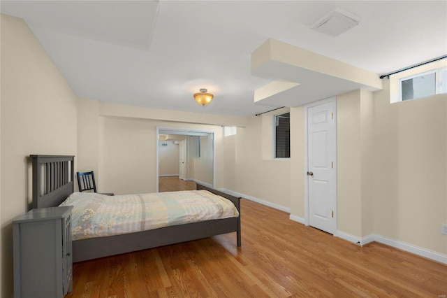 bedroom with light hardwood / wood-style floors