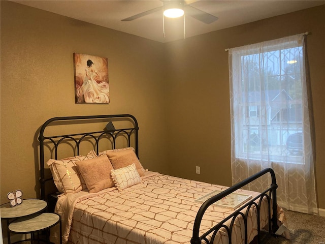 bedroom featuring carpet floors and ceiling fan