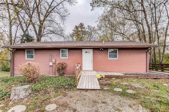 view of front of home with a deck