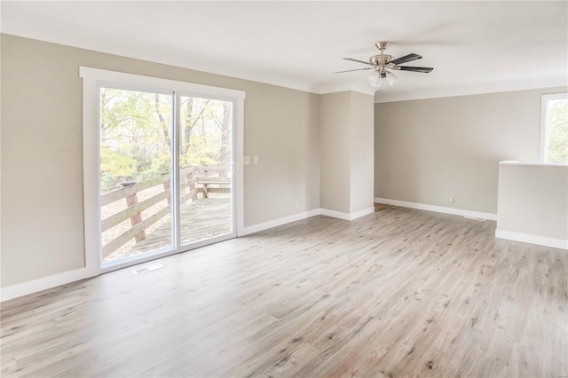 unfurnished room featuring ceiling fan and light wood-type flooring