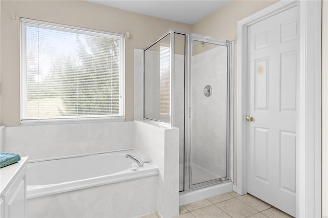 bathroom featuring vanity, tile patterned floors, and independent shower and bath