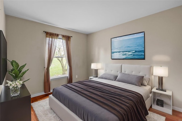 bedroom with light hardwood / wood-style floors