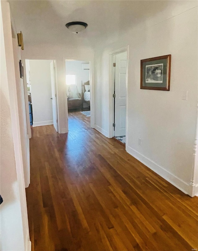 hall featuring dark wood-type flooring