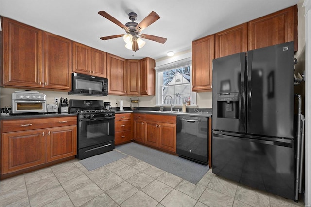 kitchen with sink, ceiling fan, and black appliances