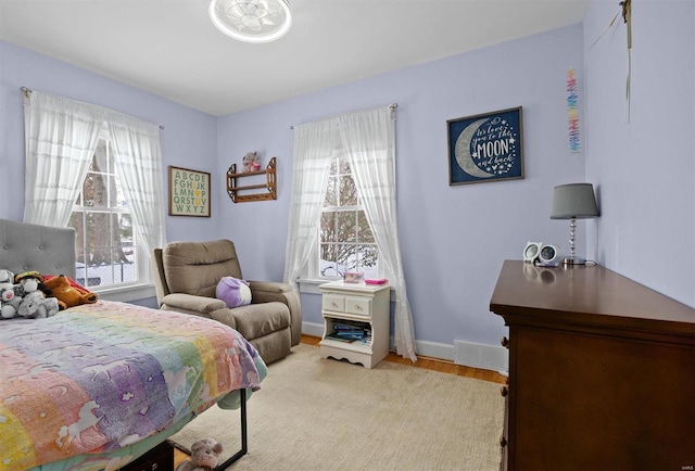 bedroom featuring light hardwood / wood-style flooring