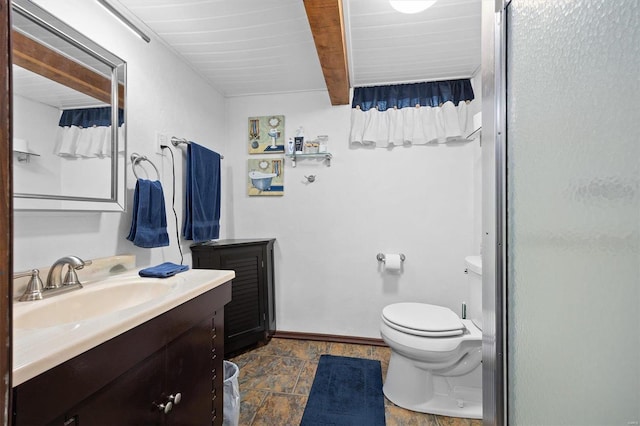 bathroom with beamed ceiling, vanity, toilet, and an enclosed shower