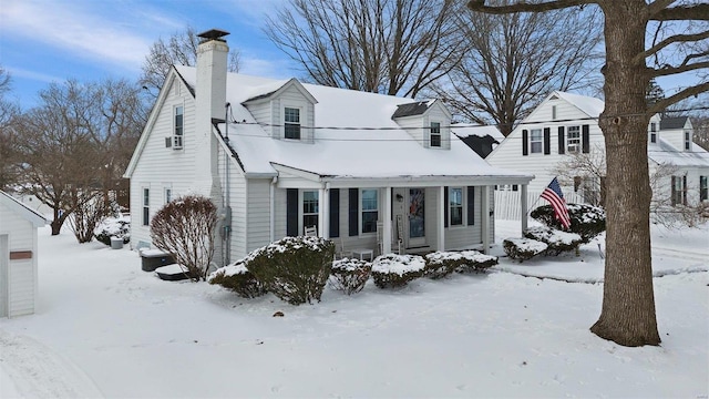 view of snow covered house