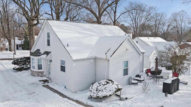 view of snow covered property