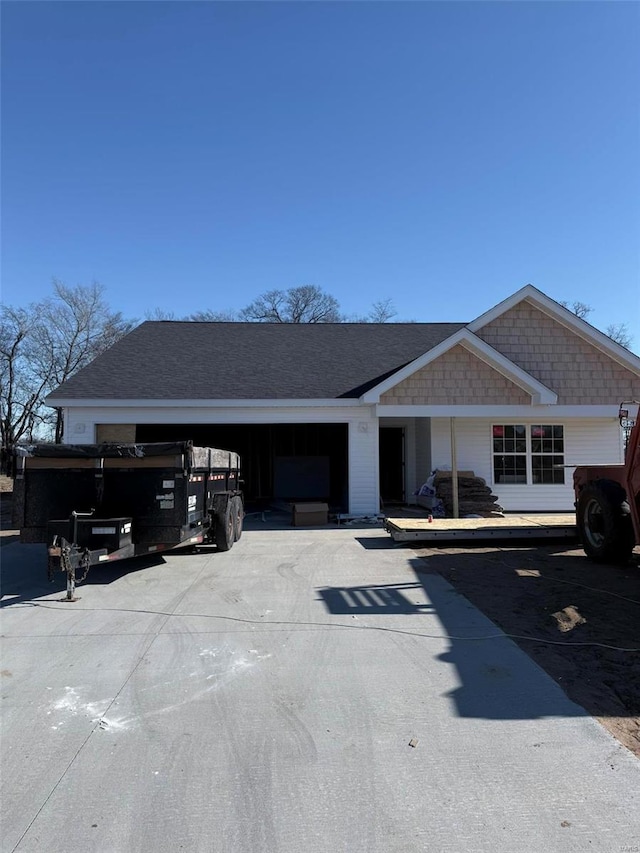 view of front of property featuring a garage