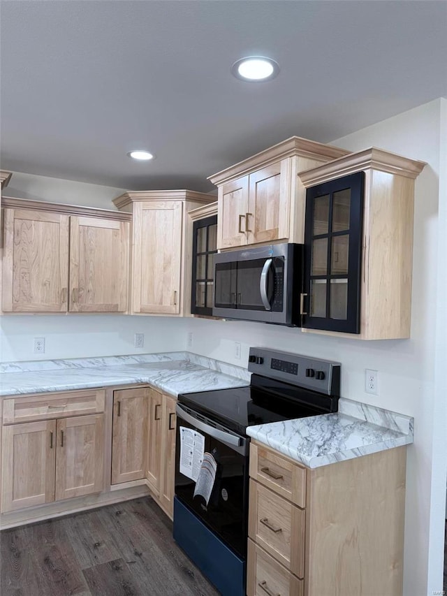 kitchen with dark wood finished floors, stainless steel appliances, recessed lighting, glass insert cabinets, and light brown cabinets