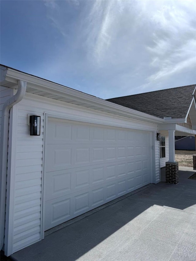 garage with driveway