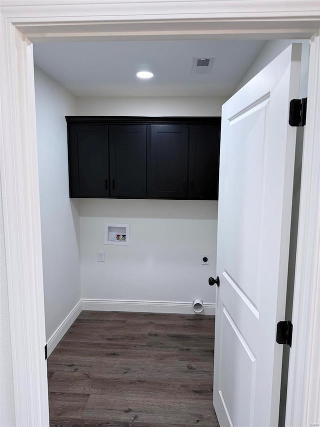 laundry room featuring washer hookup, dark wood finished floors, cabinet space, visible vents, and baseboards