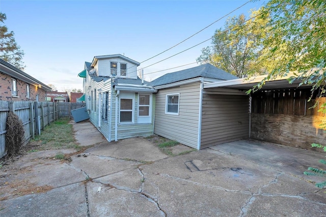 back of property featuring a patio