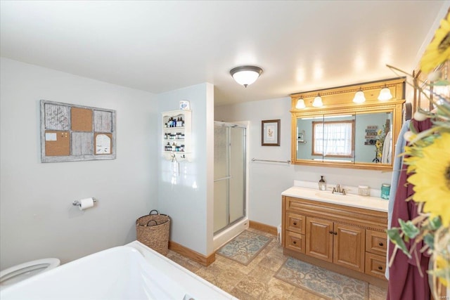 bathroom featuring vanity and a shower with shower door