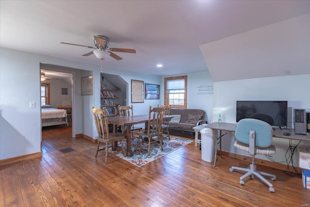 office space with hardwood / wood-style floors and ceiling fan