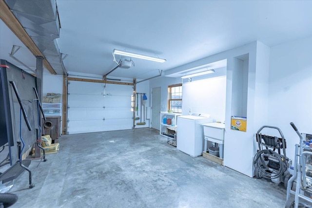 garage featuring fridge and a garage door opener