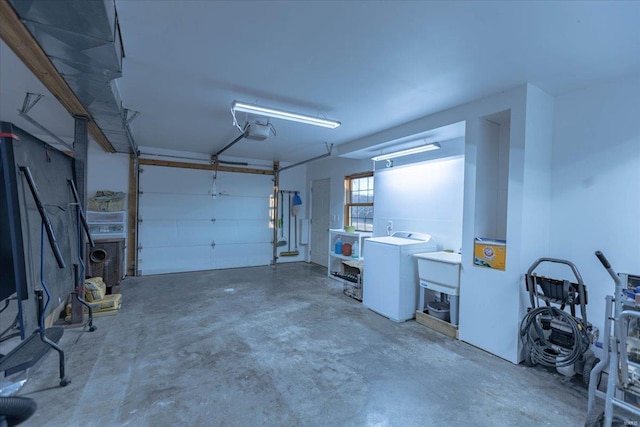 garage featuring refrigerator and a garage door opener