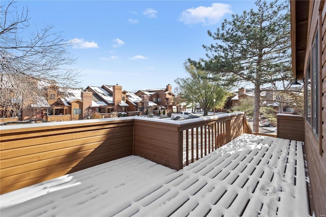 view of snow covered deck