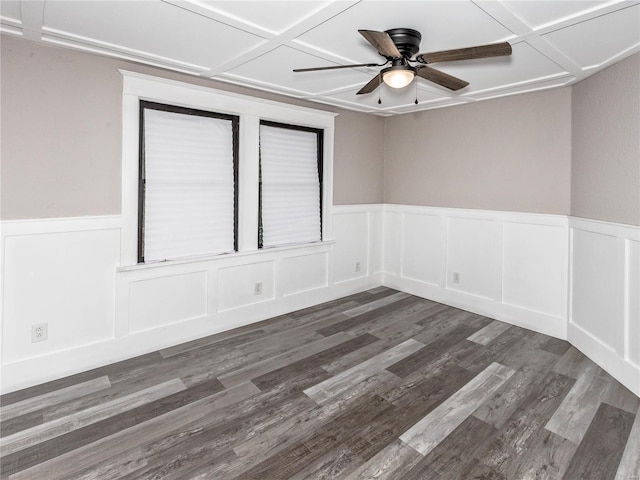 spare room with dark hardwood / wood-style flooring, ceiling fan, and coffered ceiling