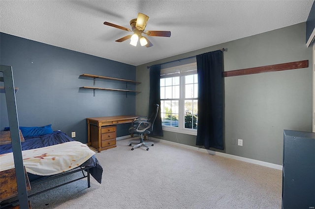 bedroom with light carpet, a textured ceiling, and ceiling fan