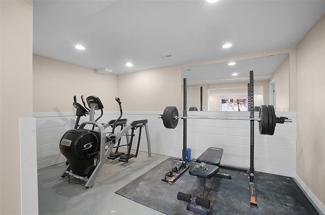 workout area featuring concrete flooring