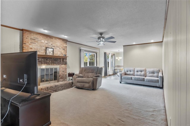 carpeted living room featuring ceiling fan, crown molding, a textured ceiling, and a brick fireplace