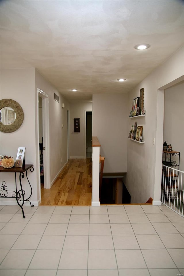 corridor featuring light wood-type flooring