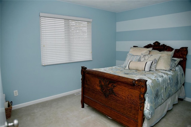 bedroom with light carpet